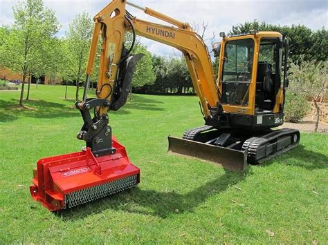 mini excavator clearing land|mulch head for mini excavator.